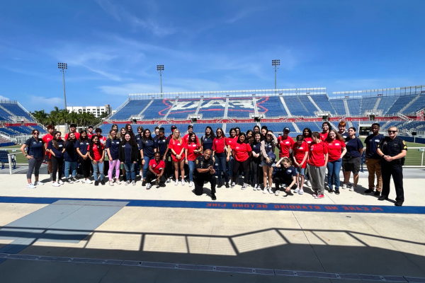 students pose for photo